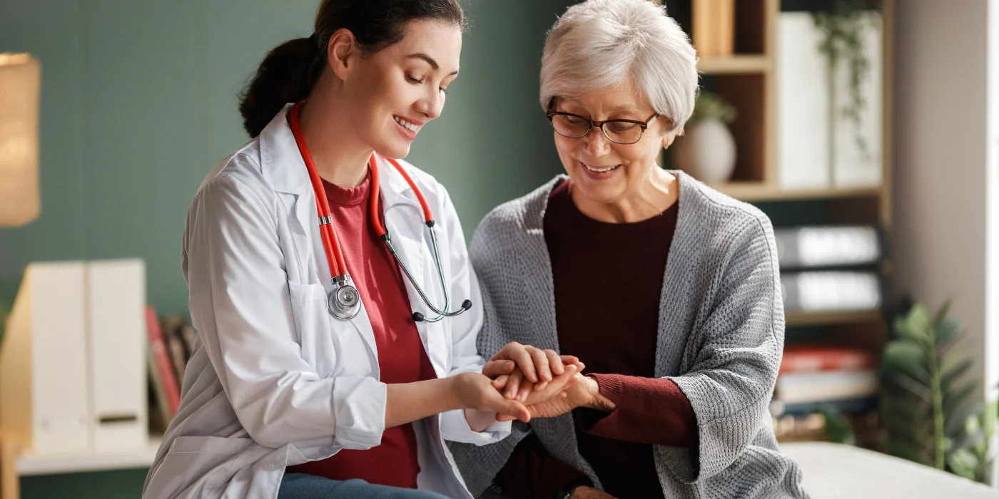 Occupational therapist supporting an adult with a home consultation