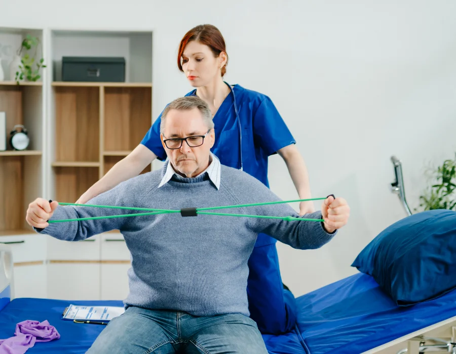 Physiotherapist delivering hands-on exercise therapy at the TheraCure clinic in South Mumbai