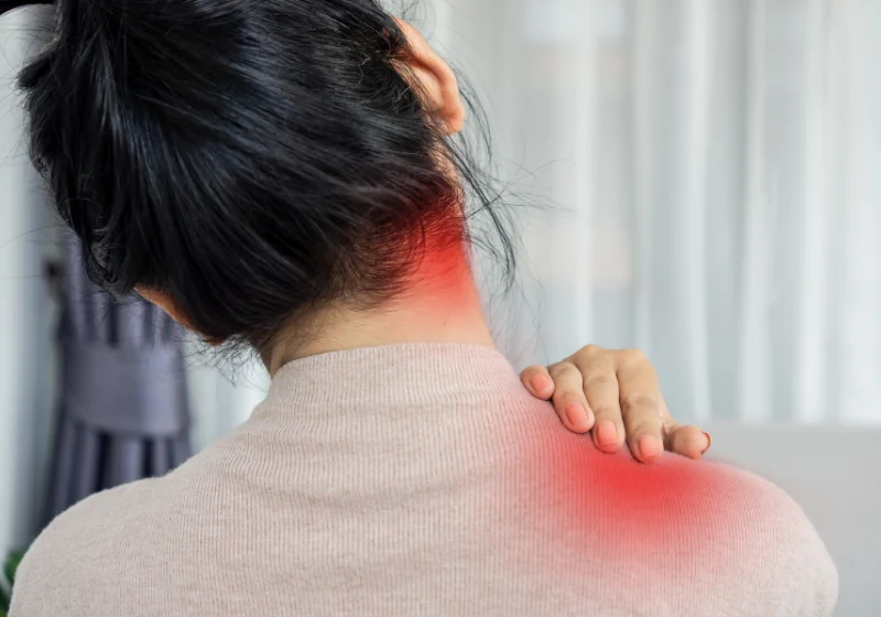 Woman with chronic neck and shoulder pain suitable for an online physiotherapy assessment
